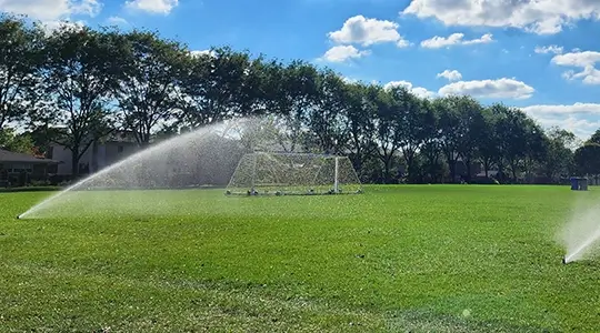 Sprinklers watering local soccer field
