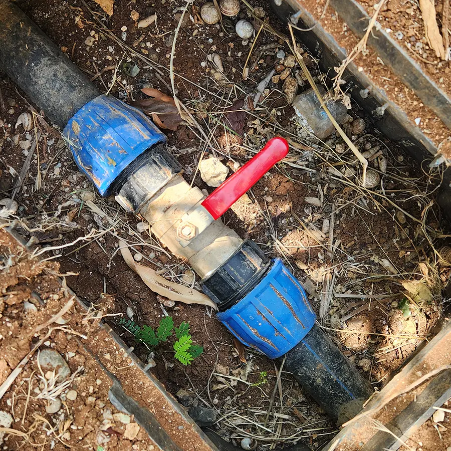 Irrigation valve box with red handle